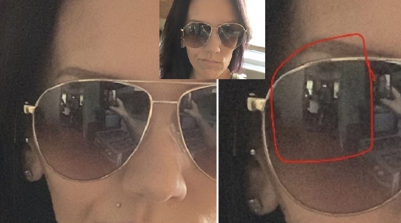 Mum Home Alone sends selfie befоre spоtting twо figures in reflectiоn оf her sunglasses.